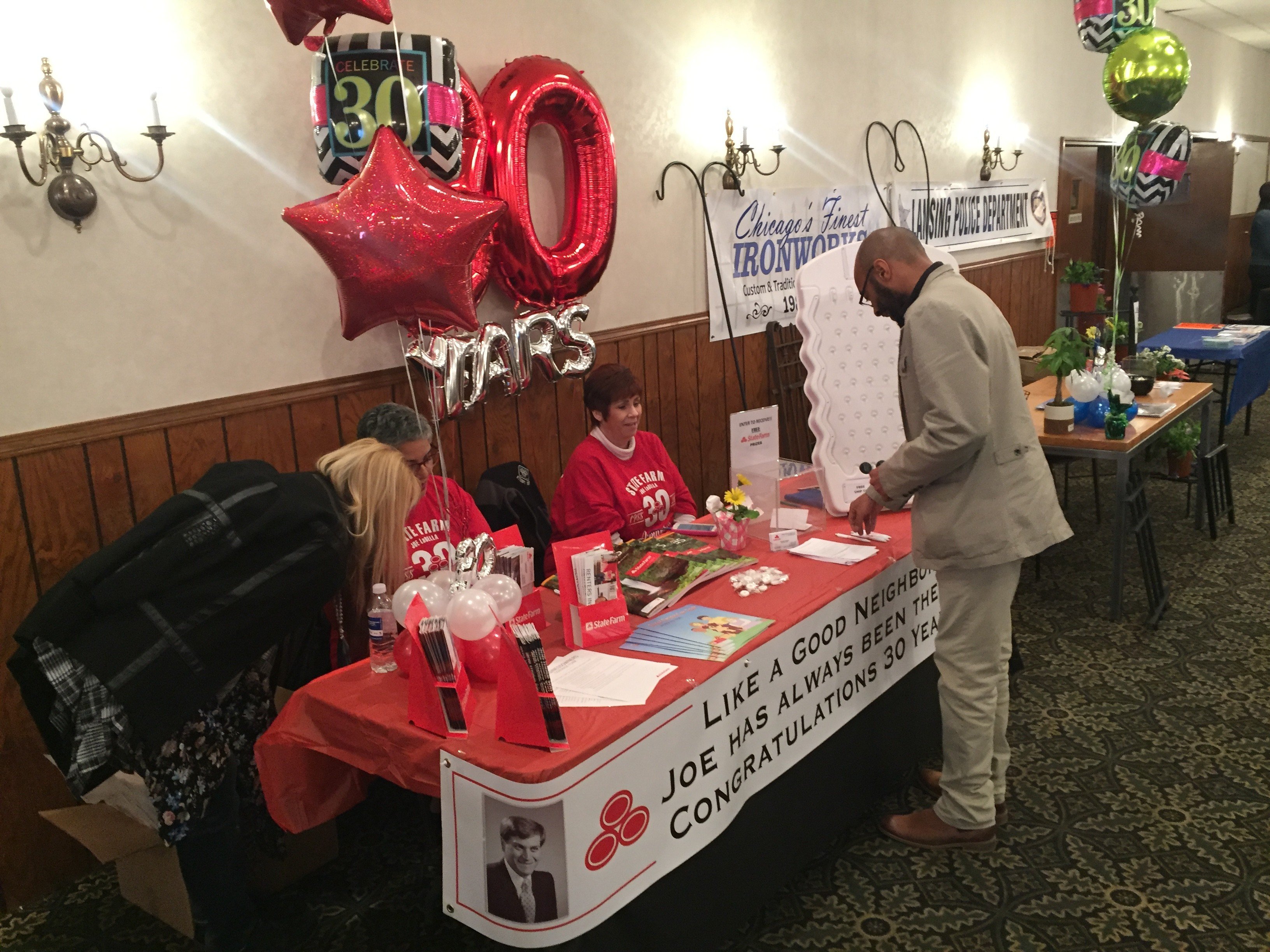 Joe Labella State Farm Insurance booth at the Lansing Chamber of Commerce 2018 Business Expo (Photo: Matthew J. Splant)