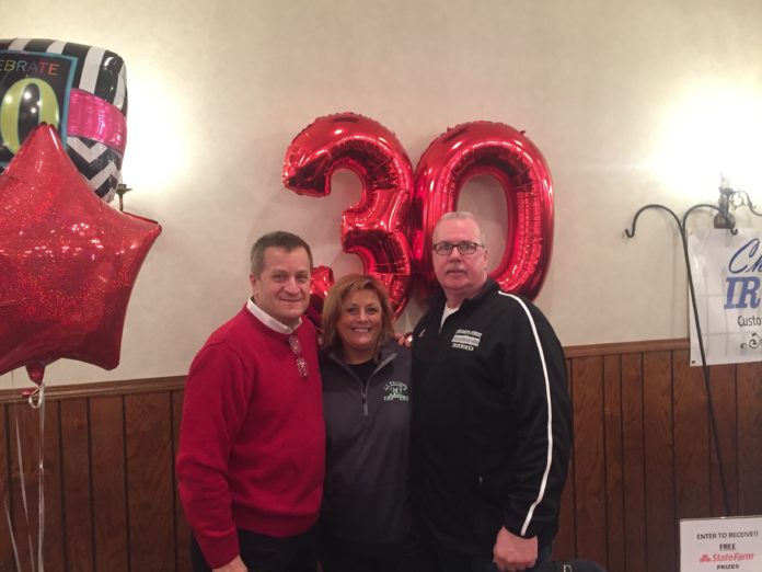 Joe Labella (State Farm Insurance), JoEllyn Kelley (JJ Kelley's restaurant), and Brian Hardy (Chicago's Finest Ironworks) at the Lansing Chamber of Commerce 2018 Business Expo. Celebrating 30 years of their businesses in Lansing, IL. (Photo: Matthew J. Splant)